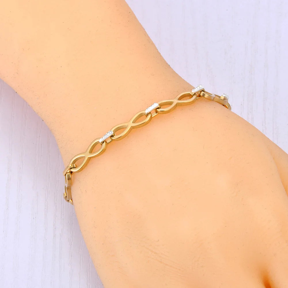 Armband mit verschlungenen Unendlichkeitssymbolen Gold