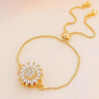 Bracelet anti-stress avec fleur rotative et cristaux or
