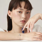 Armband mit Mondstein-Kristall und Zirkon-Sternen