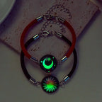 Armband mit rotem und schwarzem leuchtendem Halbmond und Sonne