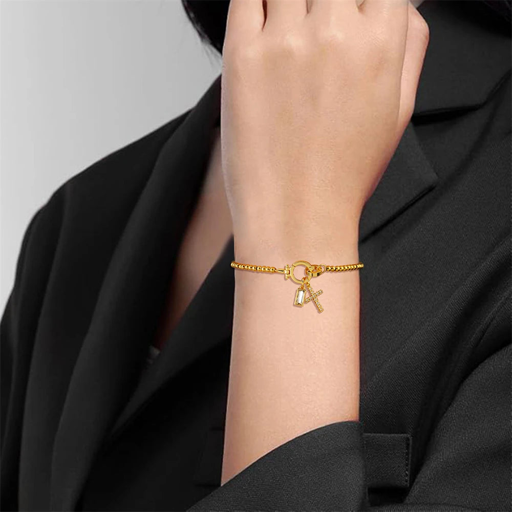 Armband mit Kreuz und Geburtsstein