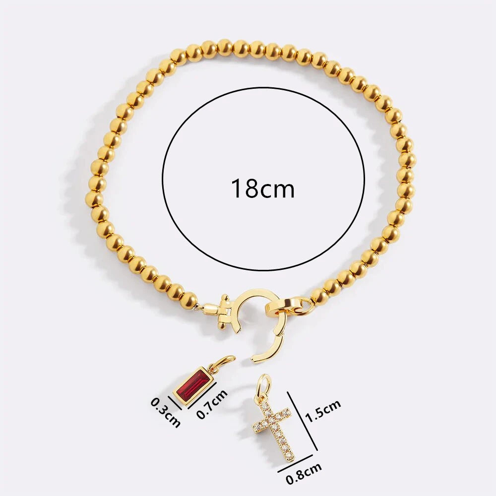 Armband mit Kreuz und Geburtsstein
