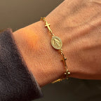 Armband mit Medaille der Jungfrau Maria und Kreuz in Gold