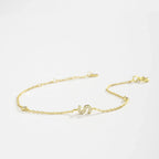 Armband mit Initiale aus goldenen Strasssteinen 