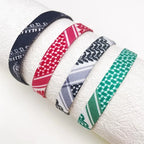Armband mit roten geometrischen Keffiyeh-Mustern