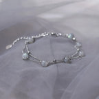 Armband mit Mondsteinperlen mit irisierenden Reflexen