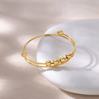 Armband mit drehbaren Anti-Stress-Perlen für Herren oder Damen in Gold