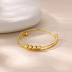 Armband mit drehbaren Anti-Stress-Perlen für Herren oder Damen in Gold