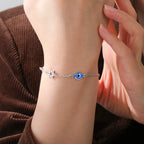 Armband mit Schutzsymbolen blaues Auge, Chai und dem <span data-glossary-id="davidstern">Davidstern</span> Silber