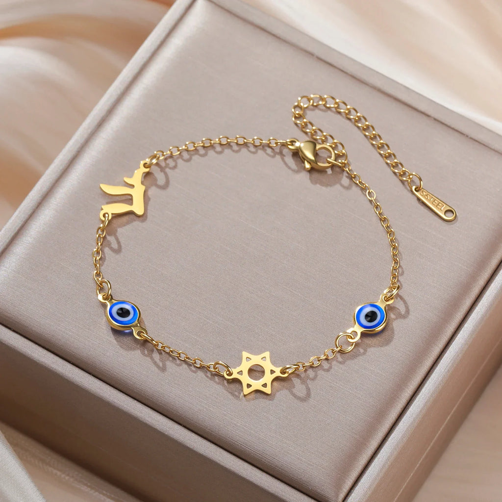 Armband mit Schutzsymbolen blaues Auge, Chai und dem <span data-glossary-id="davidstern">Davidstern</span> Gold