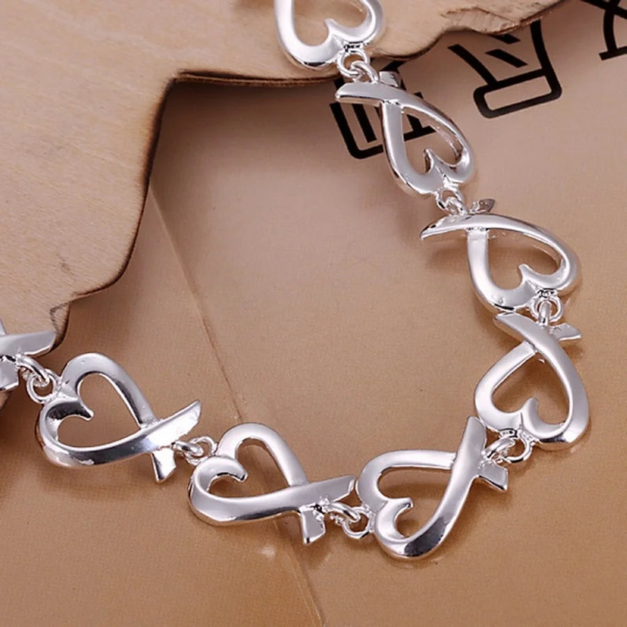 Armband mit Unendlichkeitszeichen in Herzform 