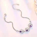 Armband mit vierblättrigen Kleeblättern mit violettem Zirkon