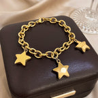Armband mit drei hängenden Sternen Gold