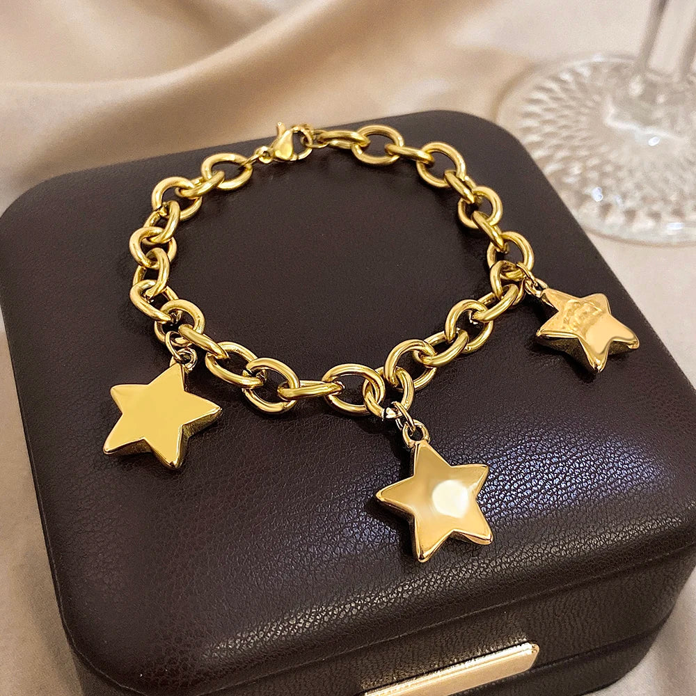Armband mit drei hängenden Sternen Gold
