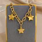 Armband mit drei hängenden Sternen Gold