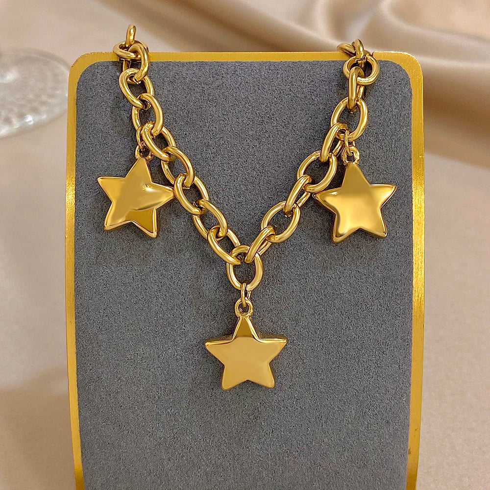 Armband mit drei hängenden Sternen Gold