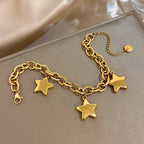 Armband mit drei hängenden Sternen Gold