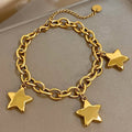 Armband mit drei hängenden Sternen Gold