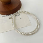 Elegantes Gourmette-Armband aus Perlen für Damen