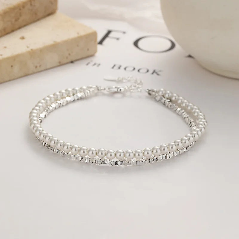 Elegantes Gourmette-Armband aus Perlen für Damen