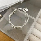 Elegantes Gourmette-Armband aus Perlen für Damen