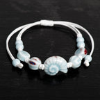 Boho-Armband Muschel Schnecke blau