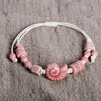 Boho-Armband Muschel Schnecke rosa
