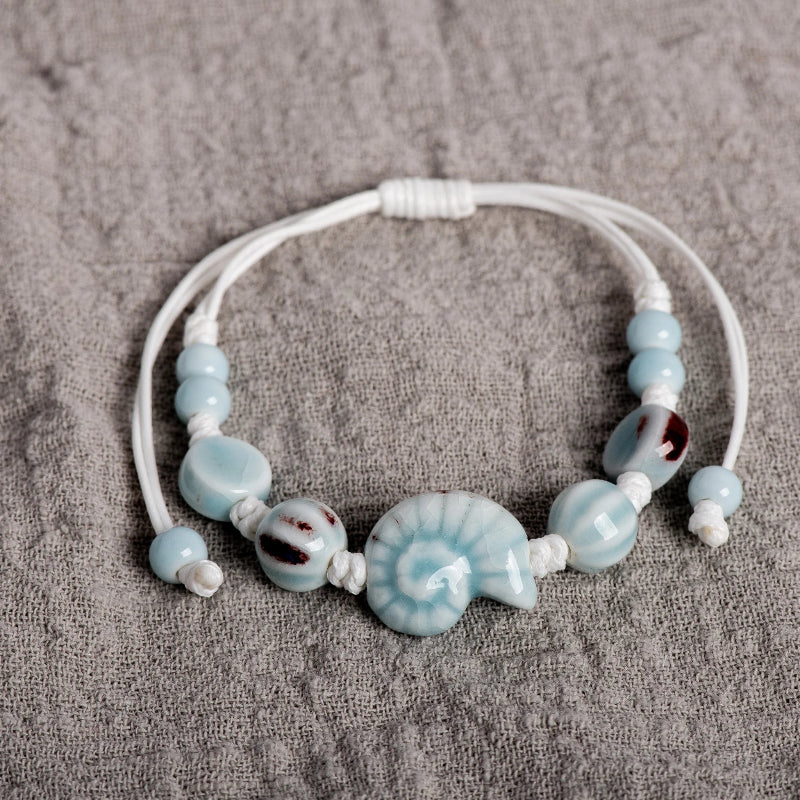 Boho-Armband Muschel Schnecke blau