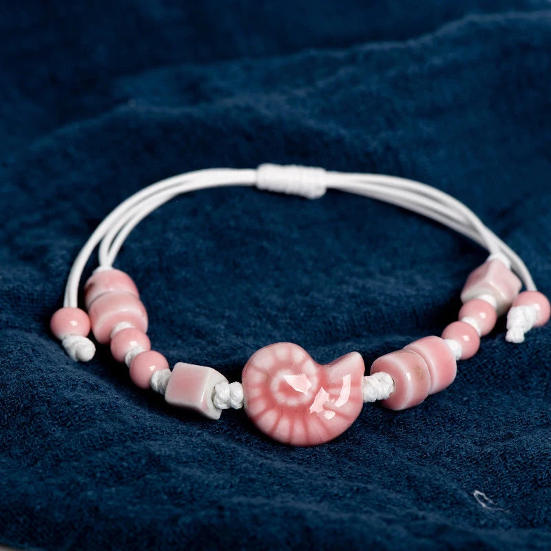 Boho-Armband Muschel Schnecke rosa