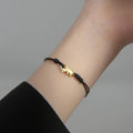Buddhistisches Armband mit schwarzem Elefanten