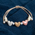 Armband mit Herz aus beiger Keramik