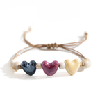 Armband mit Herz aus violetter Keramik