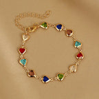 Armband mit emaillierten Herzen in Gold und Mehrfarbig