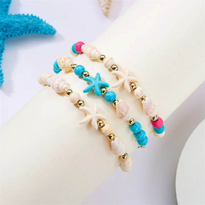 Kordelarmband mit Muschel und blauem Seestern-Stern