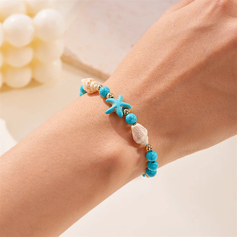 Kordelarmband mit Muschel und blauem Seestern-Stern