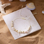 Kordelarmband mit Muschel und weißem Seestern-Stern