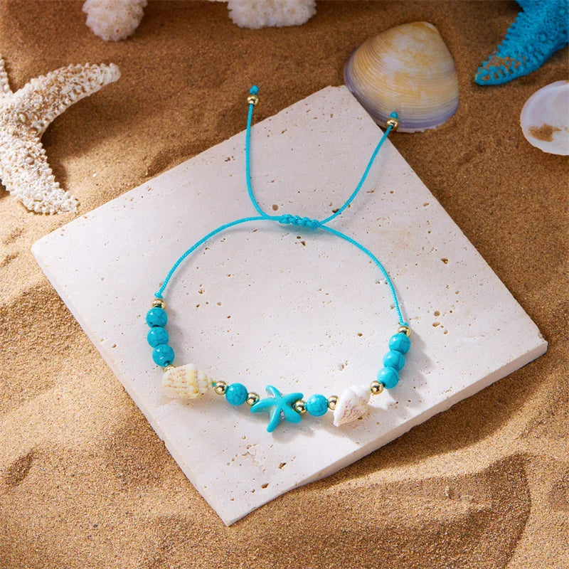 Kordelarmband mit Muschel und blauem Seestern-Stern
