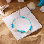 Kordelarmband mit Muschel und blauem Seestern-Stern