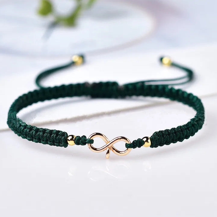 Bracciale con cordoncino intrecciato e simbolo infinito portafortuna verde