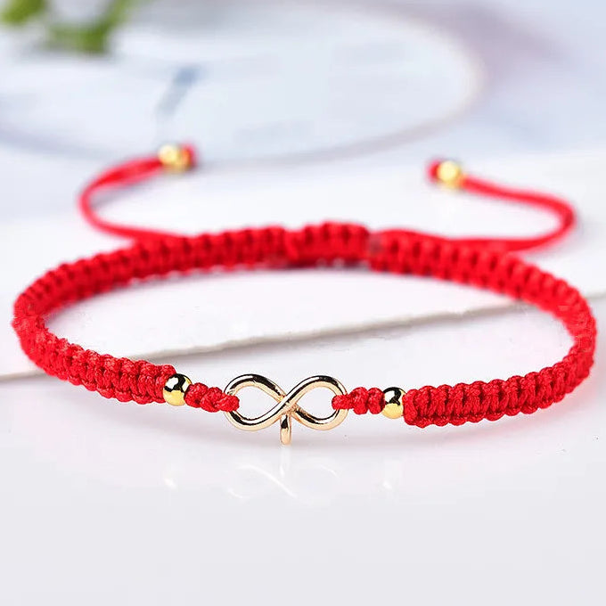 Bracciale con cordoncino intrecciato e simbolo infinito portafortuna rosso