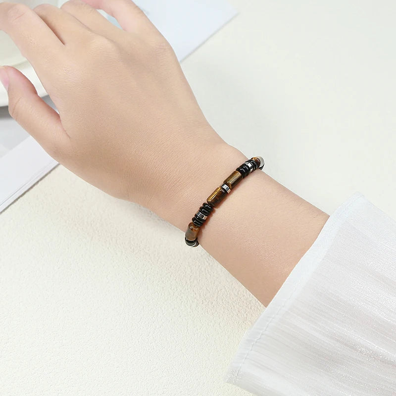 Elastisches Armband Dreifachschutz – Tigerauge, Onyx und Hämatit