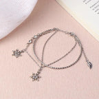 Doppelarmband mit Kristallschneeflocken