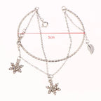 Doppelarmband mit Kristallschneeflocken