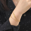 Doppelarmband mit Berganhänger gold