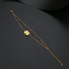 Doppelarmband mit vierblättrigem Kleeblatt in Gold