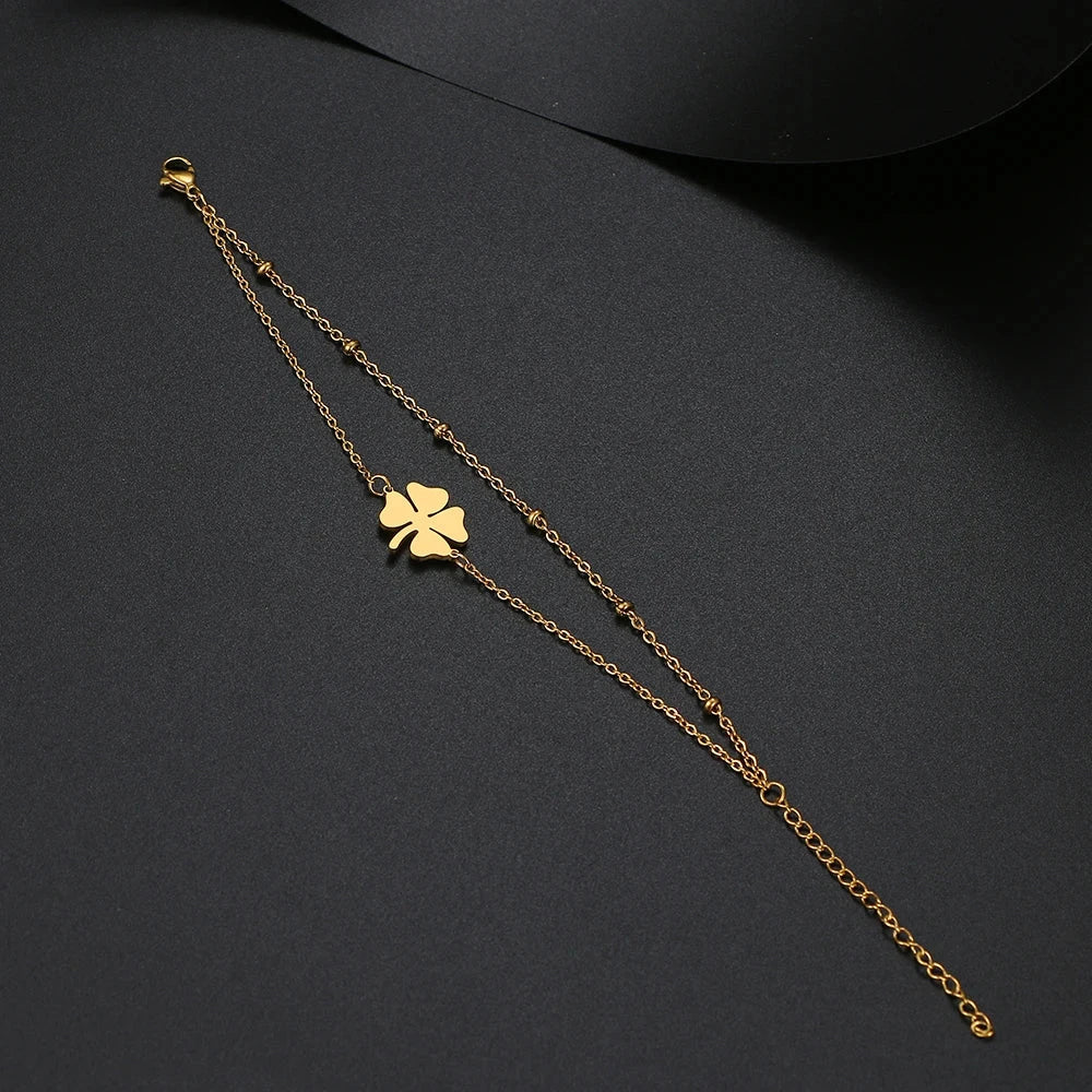 Doppelarmband mit vierblättrigem Kleeblatt in Gold