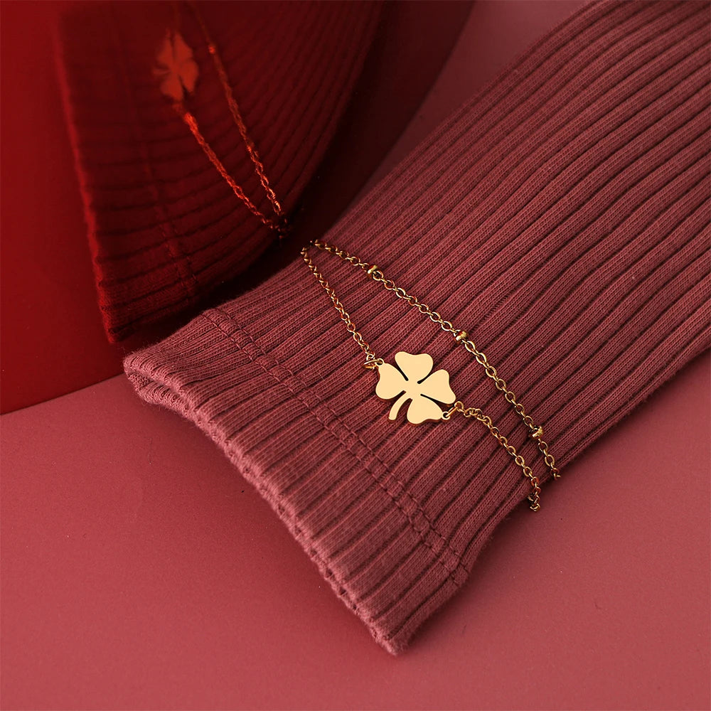 Doppelarmband mit vierblättrigem Kleeblatt in Gold