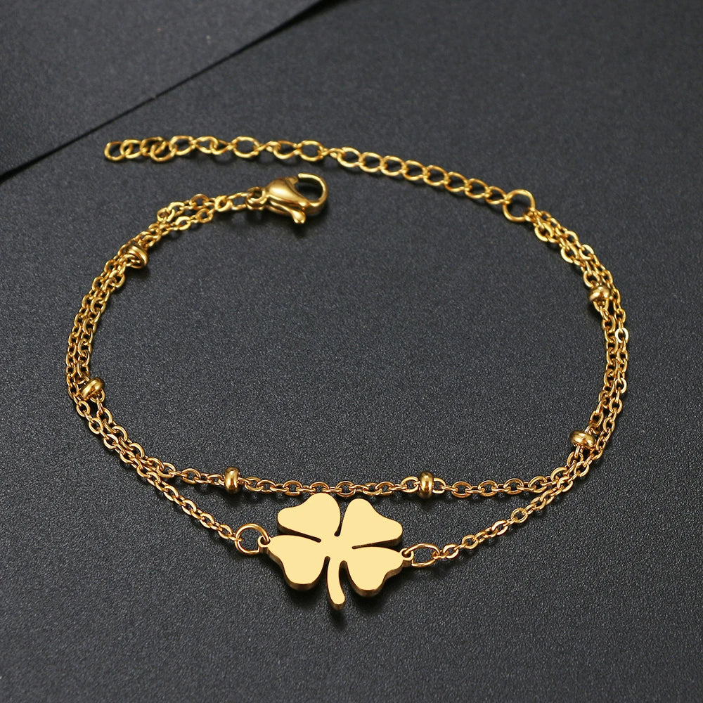 Doppelarmband mit vierblättrigem Kleeblatt in Gold