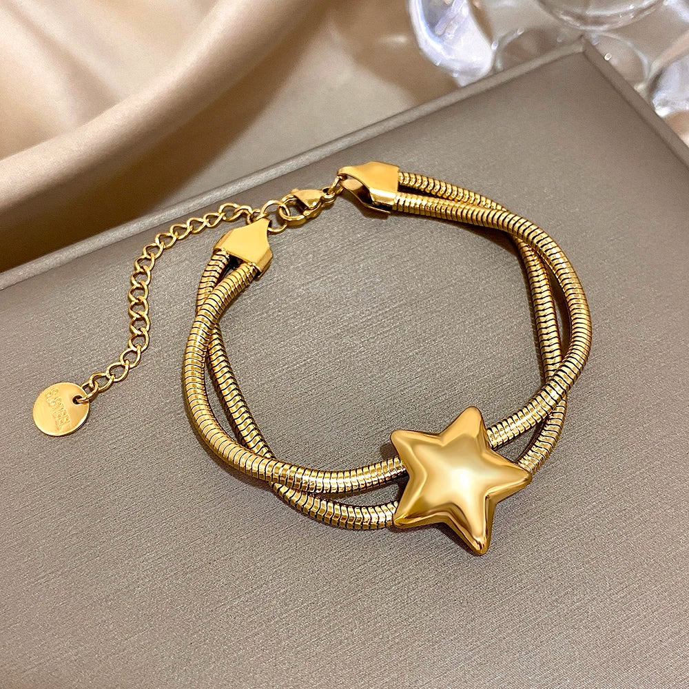 Doppelreihiges Armband mit gewölbtem Stern aus Gold