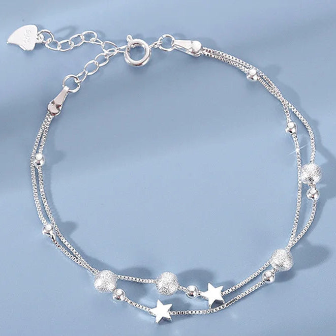 Doppelreihiges Armband mit Sternen und sandgestrahlten Perlen